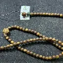 Vong-Tram-108-hat-6mm-gan-thach-anh-uu-linh-den0.webp